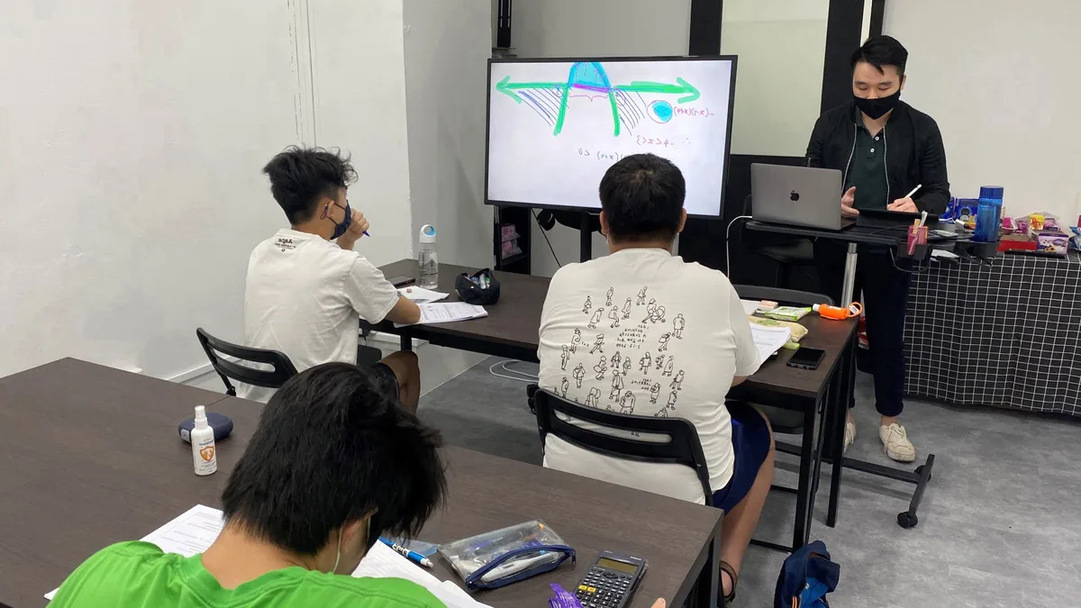 A small secondary math class at Math Vigilante with the tutor at the screen